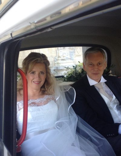 bride in cab off to the church