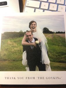 bride having a piggy back on her groom